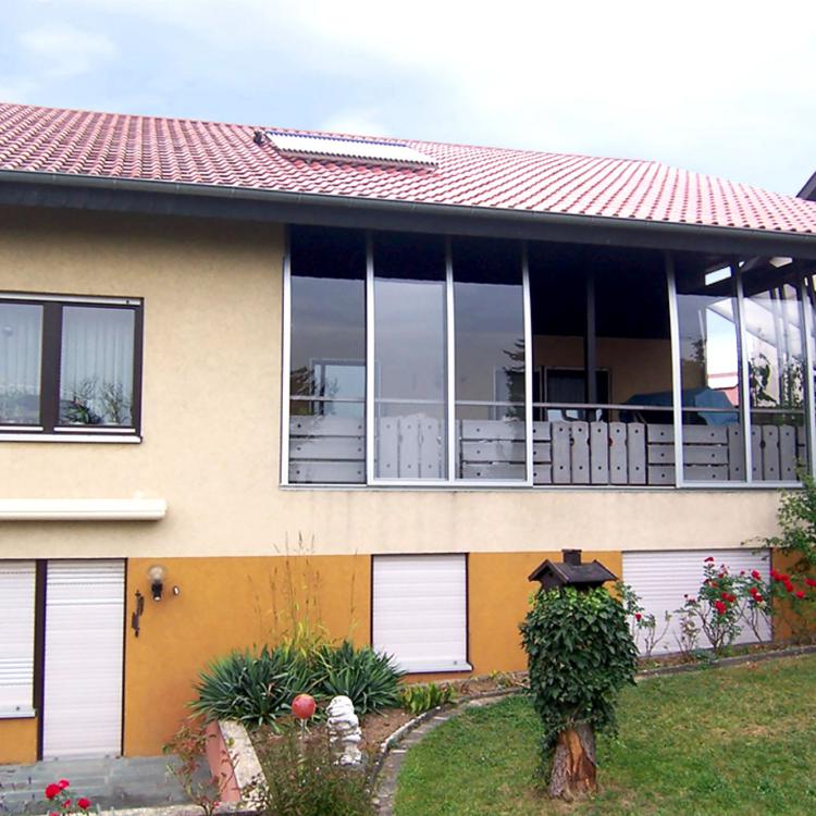 Loggia fermée par una bari coulissant Vöroka
										